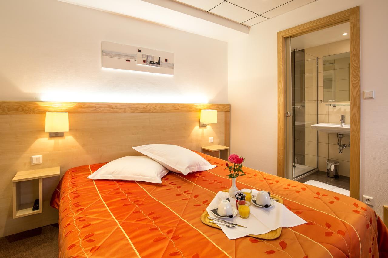 Au Soleil Hotell Wettolsheim Eksteriør bilde